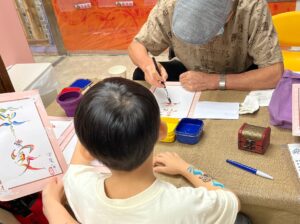 幼稚園攤位遊戲彩虹書法